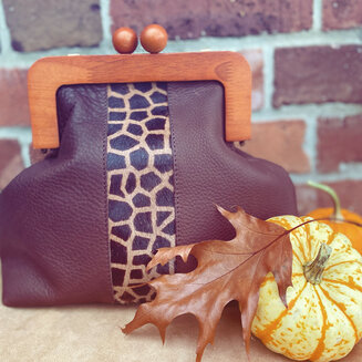 Giraffe print leather clutch