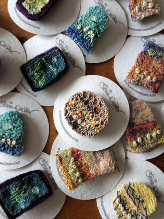 Miniature landscape brooches