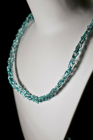 Green knitted necklace