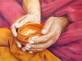 Monks hands around a Patra